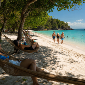 Guests relaxing on the beach at Tortuga Island