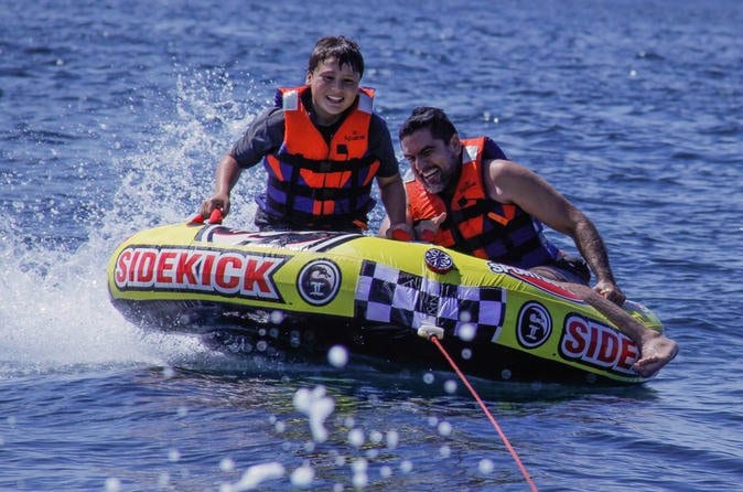 Private Boat with Towable Tube and Watersports